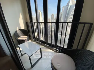 Chic urban balcony with stunning cityscape views, perfect for relaxation and enjoying the skyline.