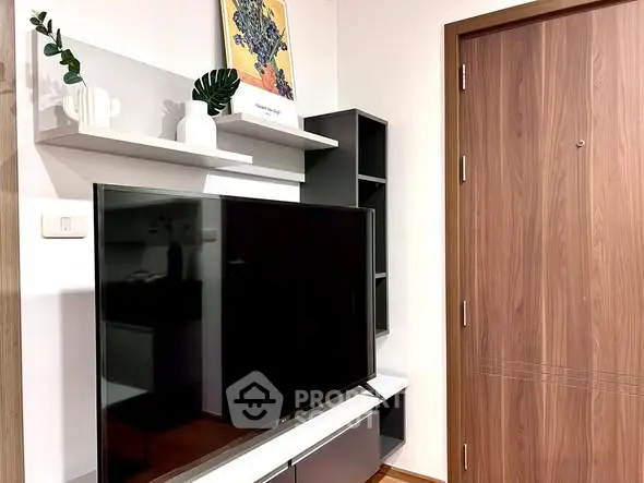 Modern living room with sleek TV setup and stylish decor