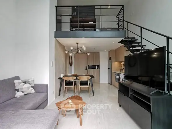 Modern loft apartment with open living area and stylish kitchen