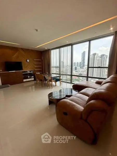 Luxurious living room with stunning city view and elegant furnishings