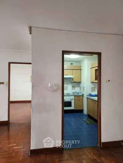 Charming kitchen with closed layout and classic wooden cabinetry