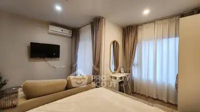 Cozy bedroom with modern decor and natural light