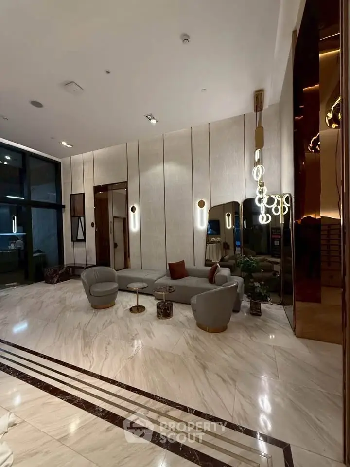 Luxurious modern lobby with elegant seating and marble flooring