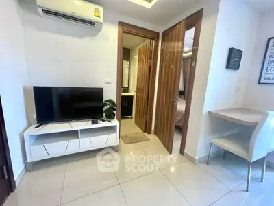 Modern apartment interior with sleek TV setup and stylish decor