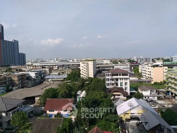 Stunning cityscape view showcasing diverse architecture and lush greenery, perfect for urban living enthusiasts.