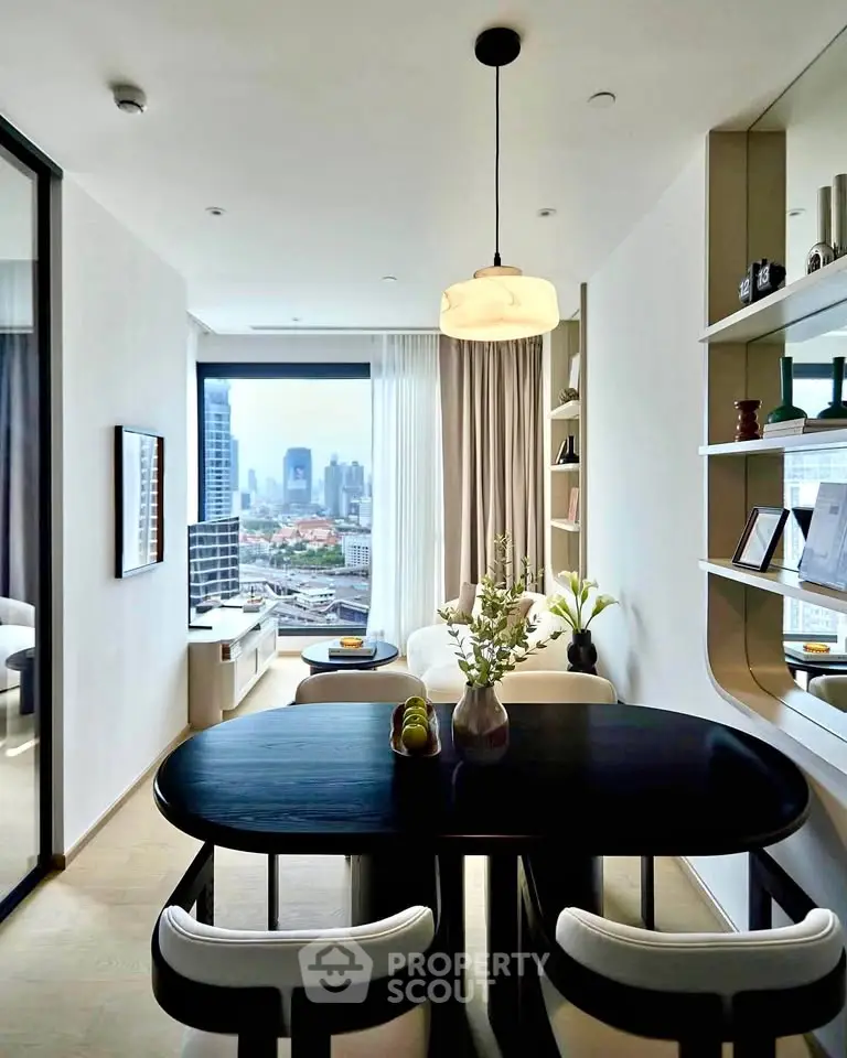 Modern living room with city view, elegant decor, and stylish dining area in a high-rise apartment.