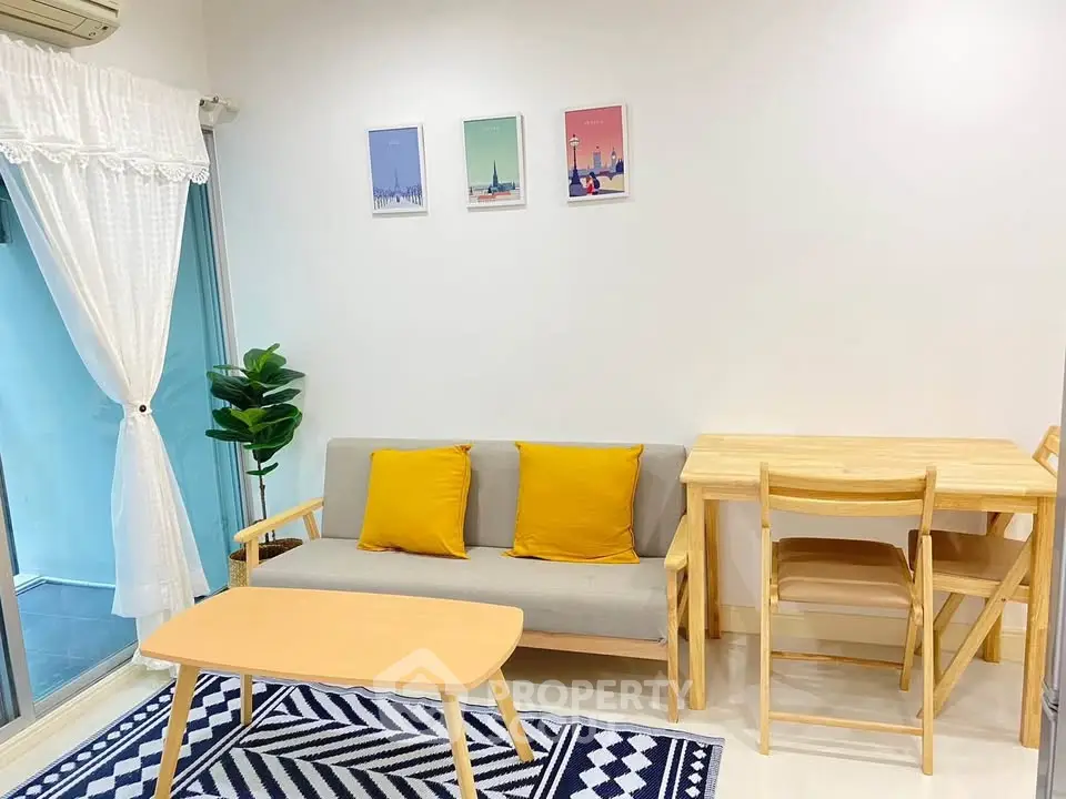 Charming living room with modern decor, cozy sofa, and dining area, perfect for urban living.
