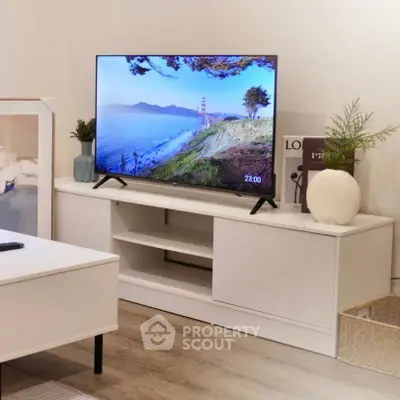 Modern living room with sleek TV setup and stylish decor