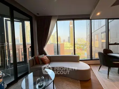 Modern living room with panoramic city view and stylish furniture