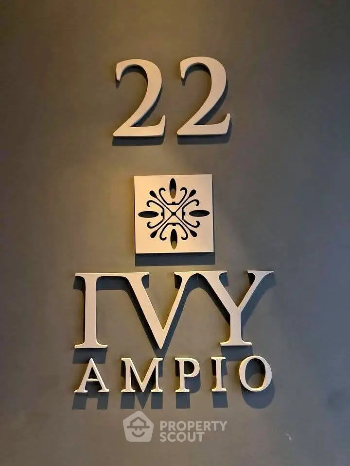 Elegant entrance sign of Ivy Ampio building with stylish design.