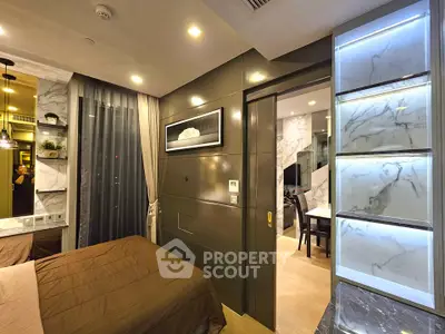 Luxurious modern bedroom with elegant marble accents and ambient lighting