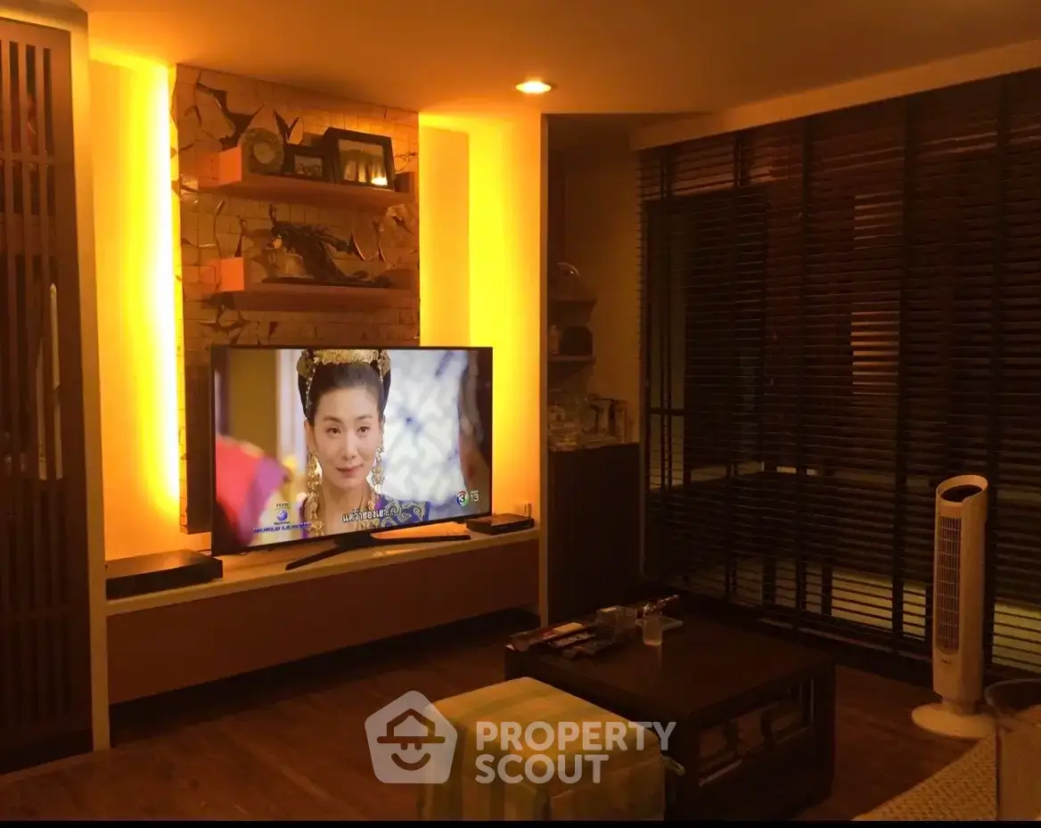 Cozy living room with ambient lighting and modern TV setup