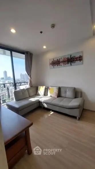 Modern living room with city view and stylish decor