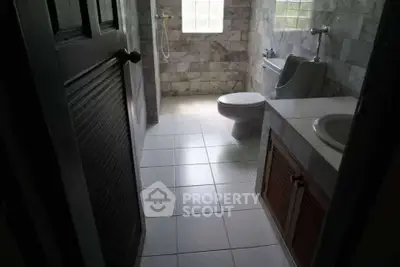 Cozy bathroom with modern fixtures and natural light