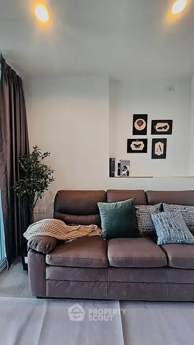 Modern living room with stylish decor and comfortable sofa