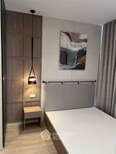 Modern bedroom with stylish decor and ambient lighting