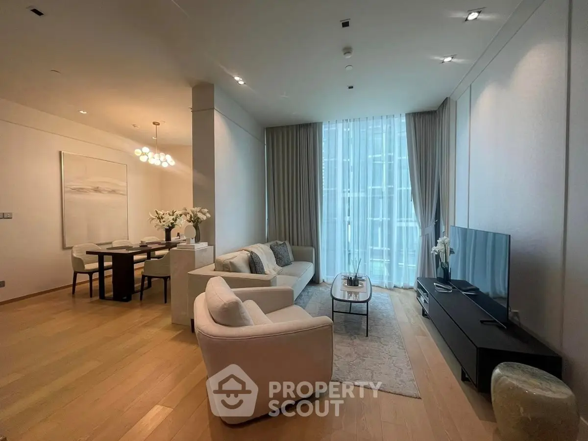 Luxurious modern living room with elegant dining area and floor-to-ceiling windows