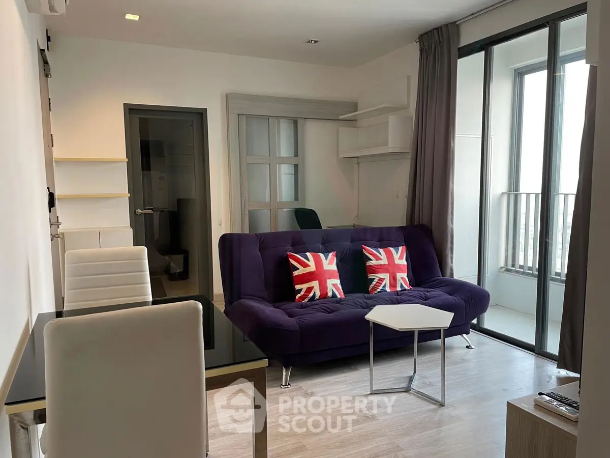 Modern living room with balcony and stylish decor in urban apartment