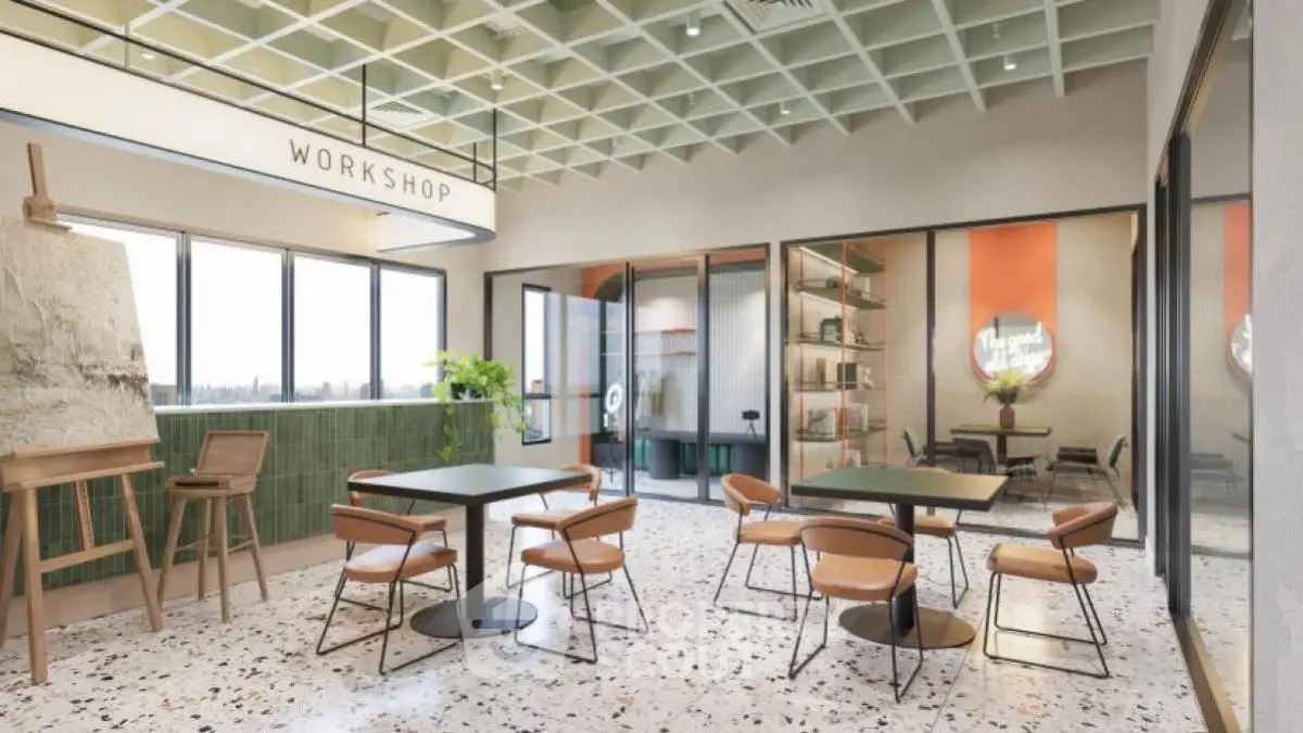 Modern workshop space with stylish decor and large windows