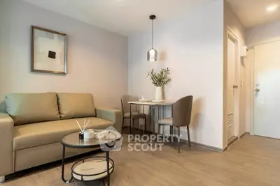 Modern living room with cozy seating and stylish dining area, perfect for urban living.