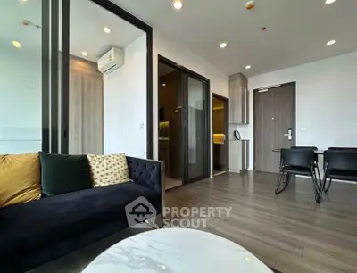 Modern living room with stylish furniture and open layout in a contemporary apartment.