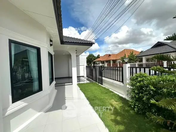 Charming suburban home with lush garden and modern exterior design.