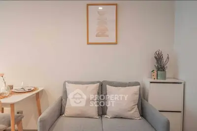 Cozy living room with modern decor and stylish furniture, perfect for relaxation and entertaining.