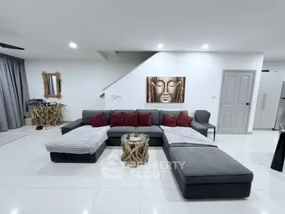 Spacious modern living room with elegant decor and comfortable seating