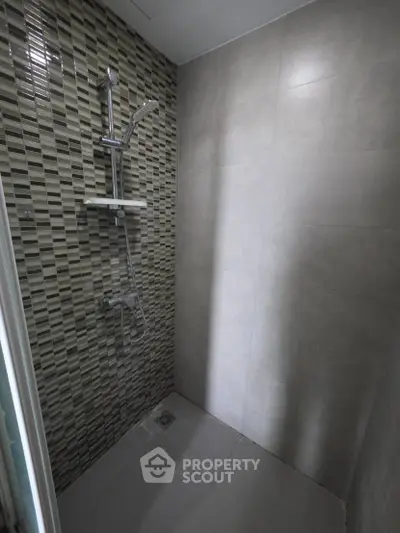 Modern bathroom with sleek shower and stylish tile design