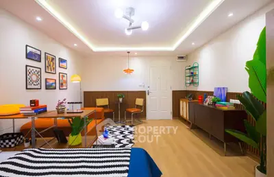 Stylish modern living room with vibrant decor and cozy seating area