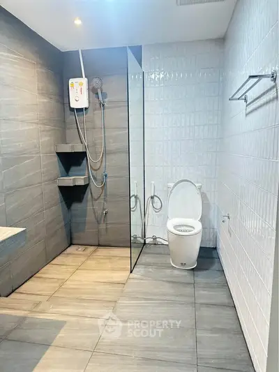 Modern bathroom with sleek design and glass shower partition