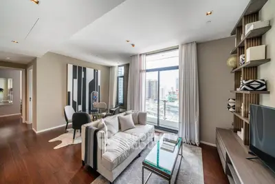 Luxurious modern living room with city view and elegant decor