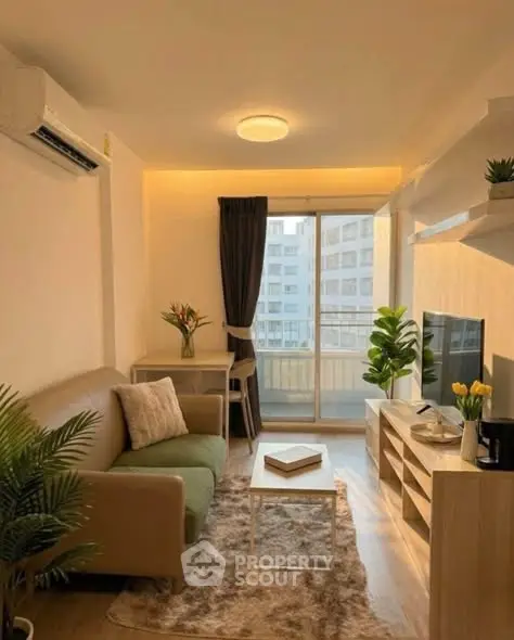 Cozy living room with modern decor, large window, and balcony view in urban apartment.