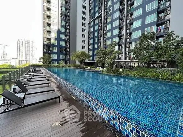 Luxurious high-rise apartment with stunning poolside view and modern amenities.