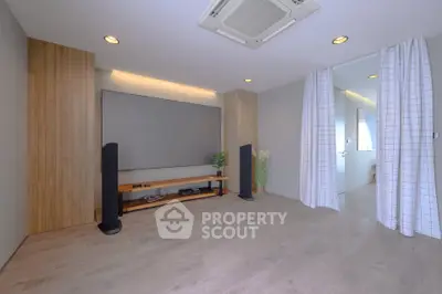 Spacious modern living room with minimalist decor and wooden accents