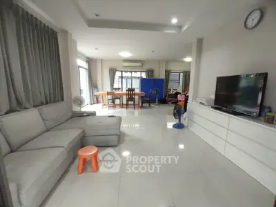 Spacious living room with modern furniture and natural light