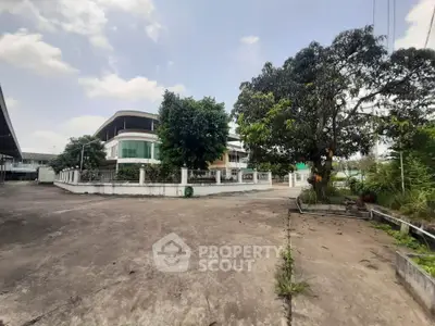 Spacious property with lush greenery and modern architecture, perfect for serene living.