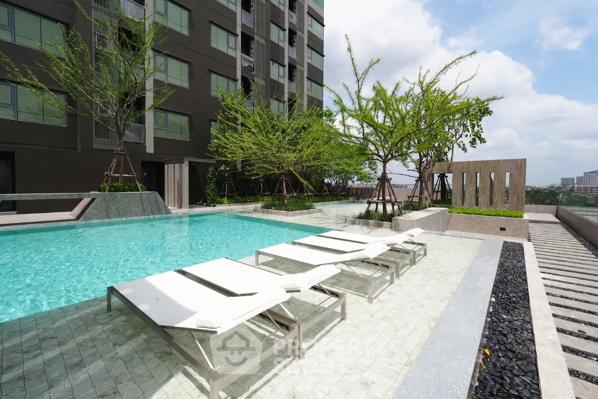 Luxurious apartment building with stunning pool and modern design