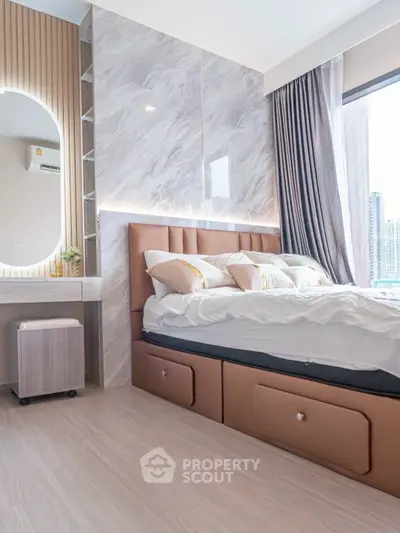 Luxurious bedroom with elegant decor and city view, featuring a stylish bed and modern furnishings.