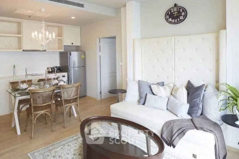 Stylish open-plan living room with modern kitchen and elegant decor