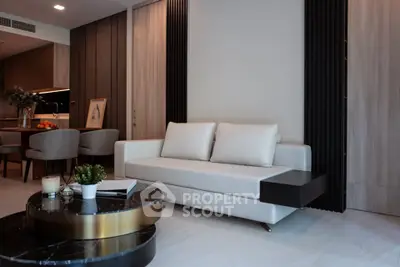 Modern living room with sleek furniture and stylish decor in a contemporary apartment.