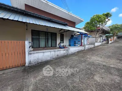 Charming residential exterior with modern design and spacious driveway