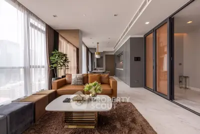 Luxurious modern living room with elegant decor and large windows offering city views.
