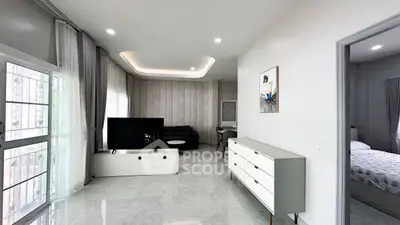 Spacious modern living room with sleek design and natural light