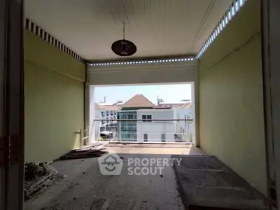 Spacious balcony with city view, perfect for relaxation and outdoor activities.