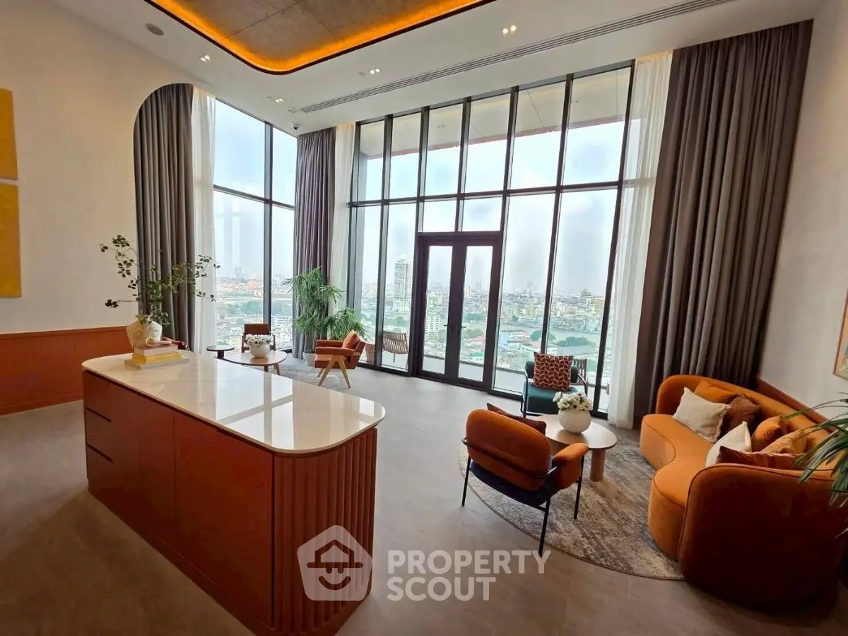 Luxurious living room with floor-to-ceiling windows and stunning city view.