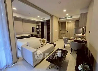 Modern studio apartment with open layout and stylish furnishings