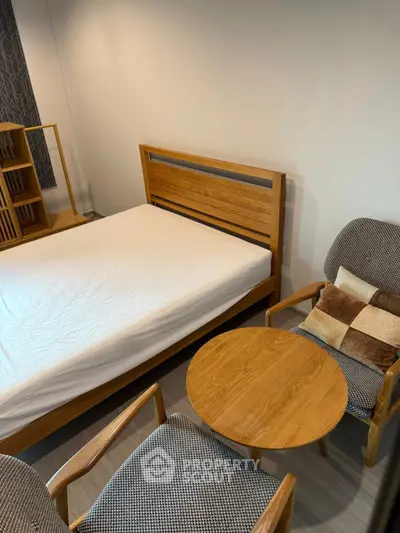 Cozy bedroom with wooden furniture and stylish decor