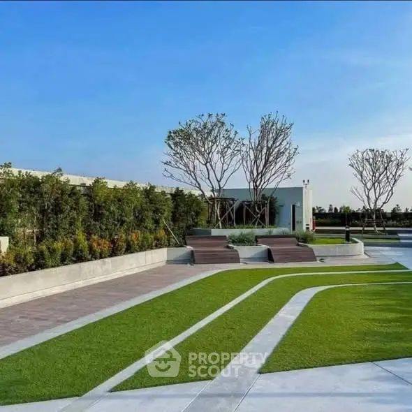 Modern rooftop garden with sleek design and lush greenery