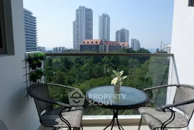 Charming balcony with city view, perfect for relaxation and enjoying the skyline.